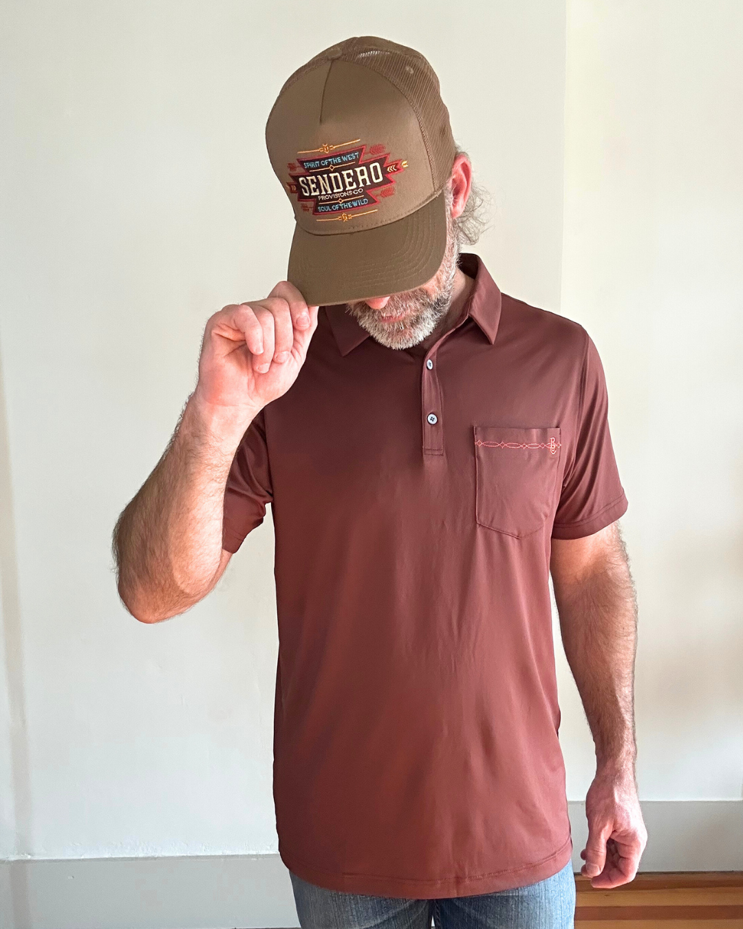 Raised by Coyotes | Bootstitch Pocket Polo| Texas Maroon
