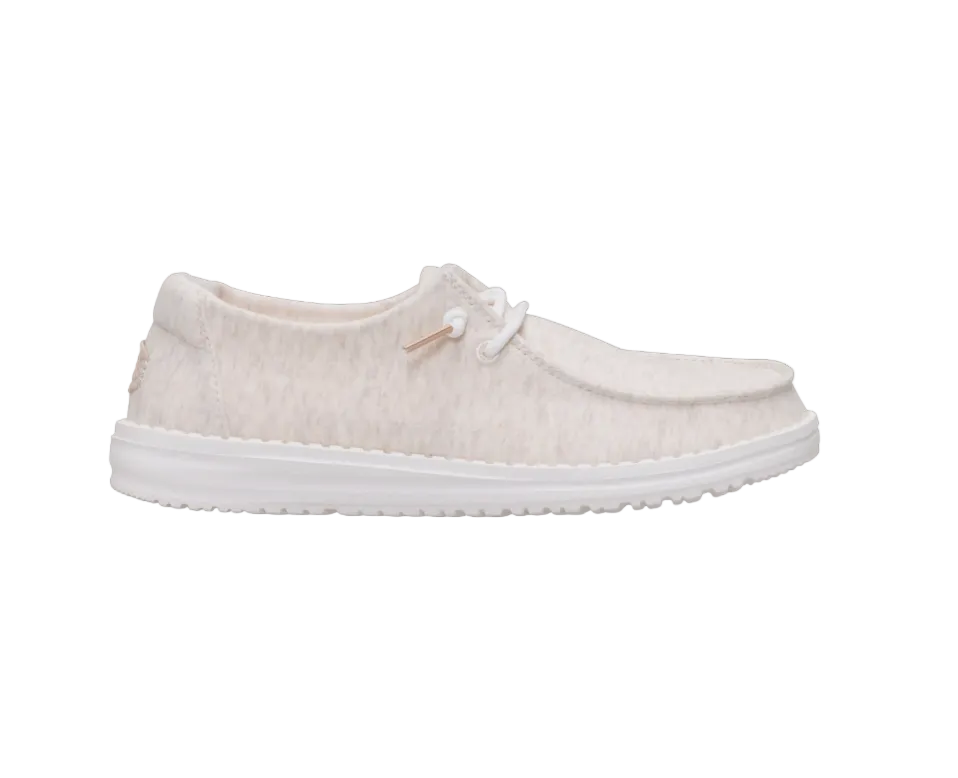 White sneaker with a textured surface on a white background