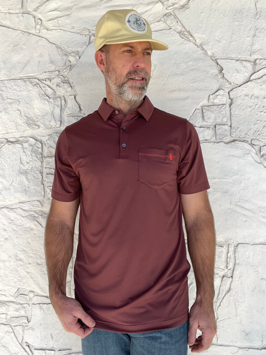 Raised by Coyotes | Bootstitch Pocket Polo| Texas Maroon