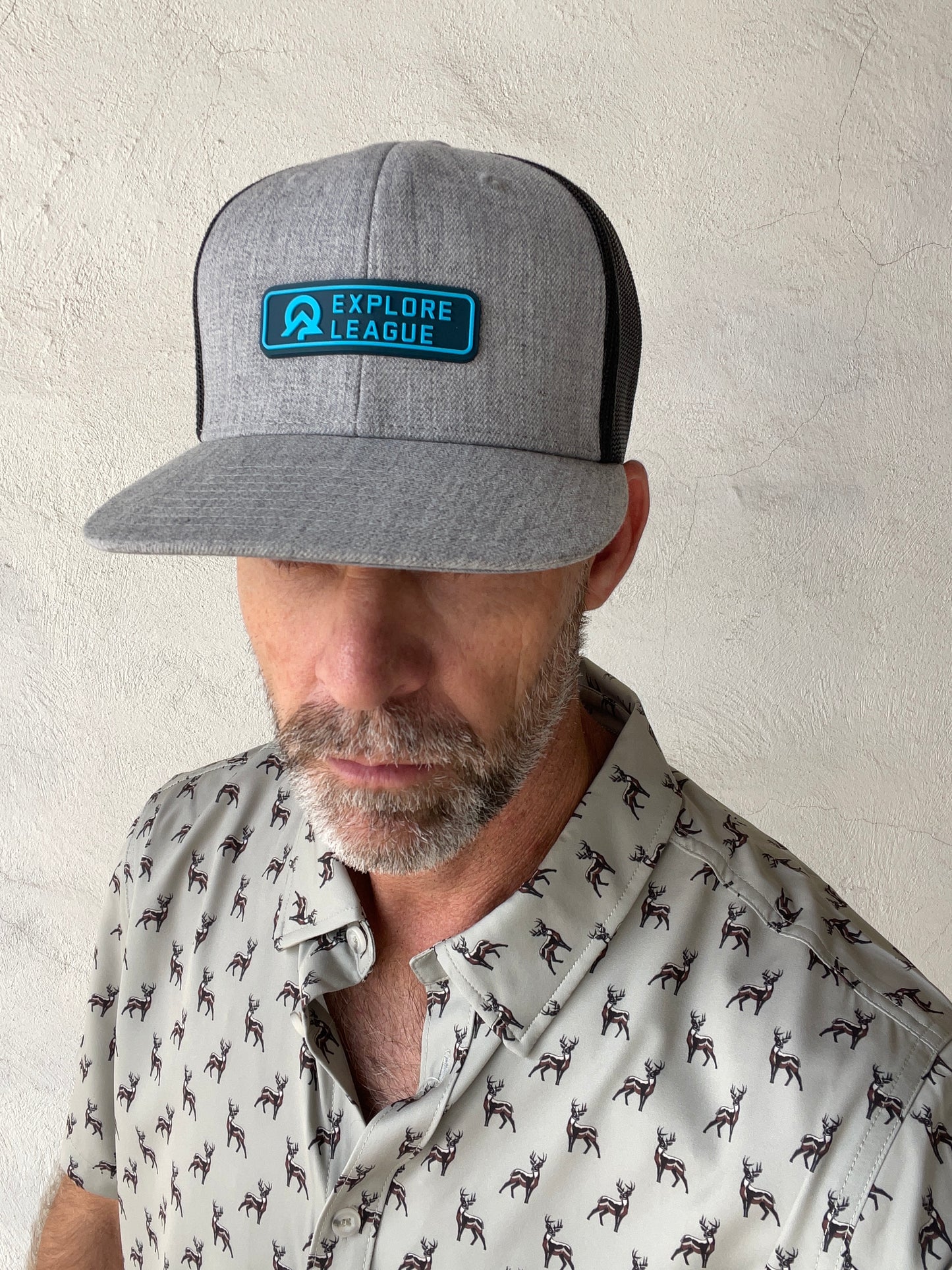 Explore League | Heather Gray Black Trucker Cap 511  | Blue PVC Patch