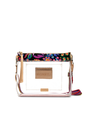 A clear plastic crossbody bag with a colorful patterned top band, gold-tone hardware, and a tan leather brand patch on the front.