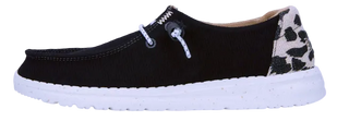 A women's casual shoe by HEYDUDE, featuring a black canvas upper with leopard print detailing on the heel and a white sole.