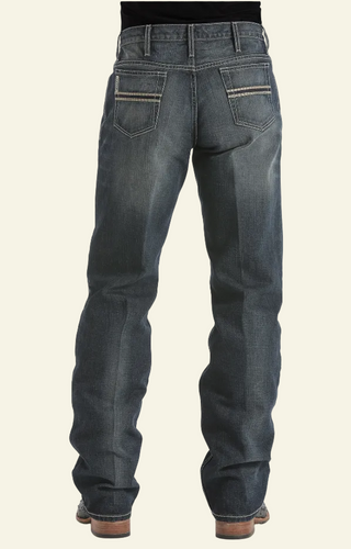 A pair of men's dark stone colored Cinch white label jeans, showing the back rise and pockets.