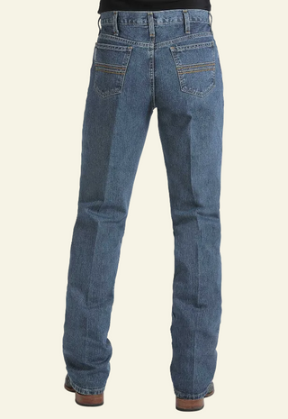 A pair of men's medium stone wash Cinch jeans, showing the back rise and pockets.