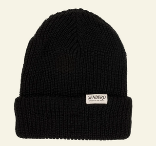 knitted beanie in black on cream background