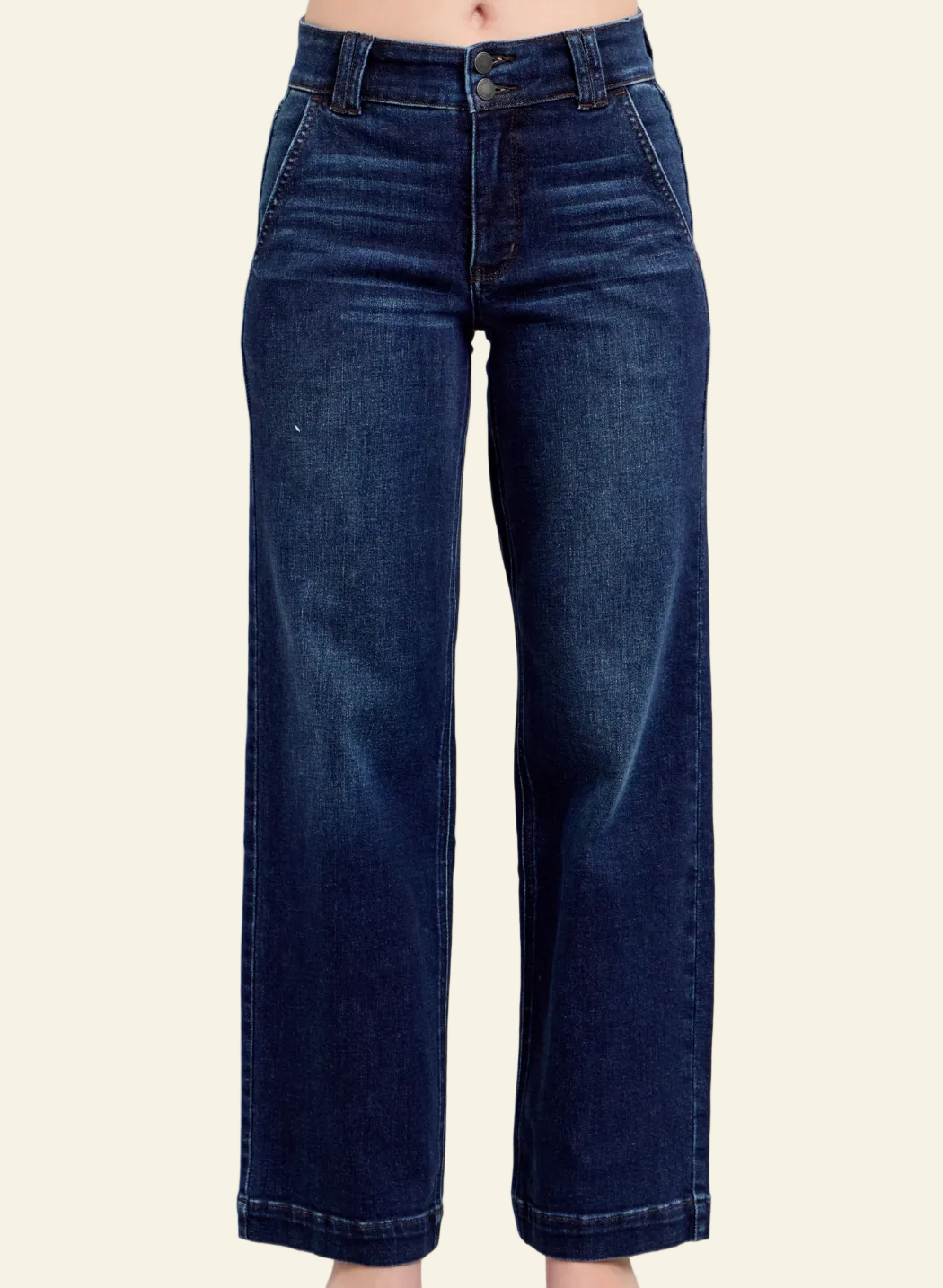 Dark blue jeans on a plain background