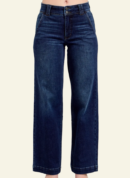 Dark blue jeans on a plain background