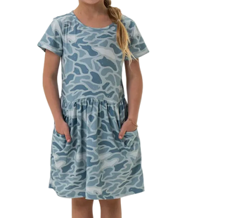 Girl wearing a blue camouflage dress on a white background