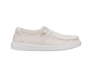 White sneaker with a textured surface on a white background