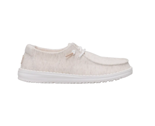 White sneaker with a textured surface on a white background