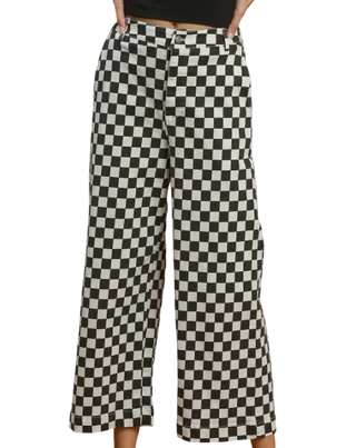 Black and white checkerboard cropped wide-leg pants shown on a model 