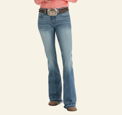 Blue jeans with a decorative belt on a white background
