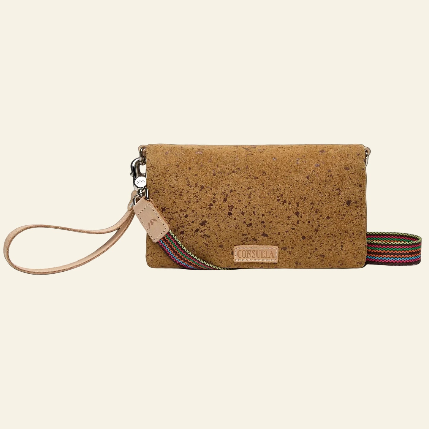 Brown cork / cider color handbag with a strap on a white background